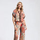 Conjunto de 2 piezas de top estampado y pantalones de pierna ancha para mujer