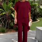 Encantador conjunto de camiseta irregular y pantalones de pierna ancha