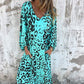 Vestido fluido estampado con cuello en V y bolsillos💕Compre 2 envío gratis💕
