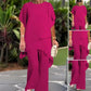 Encantador conjunto de camiseta irregular y pantalones de pierna ancha