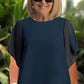 Encantador conjunto de camiseta irregular y pantalones de pierna ancha