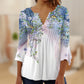 Top de botones con cuello en V y estampado floral y mangas acampanadas