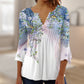 Top de botones con cuello en V y estampado floral y mangas acampanadas