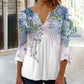 Top de botones con cuello en V y estampado floral y mangas acampanadas