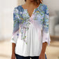 Top de botones con cuello en V y estampado floral y mangas acampanadas