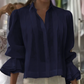 Camisa elegante con mangas de volantes y pliegues
