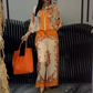 Conjunto de 2 piezas de top con cremallera estampada y pantalones de pierna ancha
