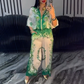 Conjunto de 2 piezas de top con cremallera estampada y pantalones de pierna ancha