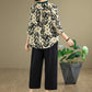 Elegante conjunto de top con cuello en V y pantalones rectos