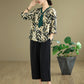 Elegante conjunto de top con cuello en V y pantalones rectos