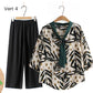 Elegante conjunto de top con cuello en V y pantalones rectos
