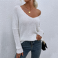 Top de punto con cuello en V suelto y elegante