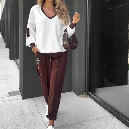 Conjunto de sudadera con capucha y pantalones jogger con bloques de color