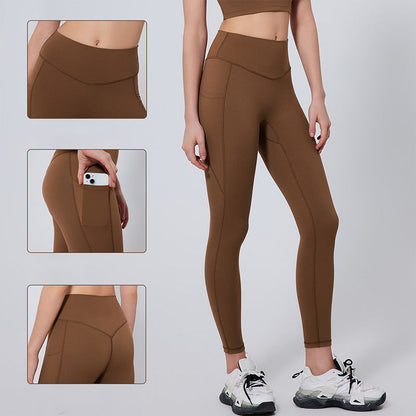 Leggings de entrenamiento para el control del abdomen de cintura alta y modelado en bolsillos laterales