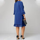 Elegante vestido midi holgado con escote en V y mangas acampanadas