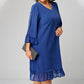 Elegante vestido midi holgado con escote en V y mangas acampanadas