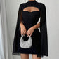 Vestido femenino con recortes acanalados y capa de gasa