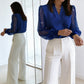 Top con cuello en V y mangas transparentes con lentejuelas