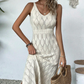 Elegante vestido puntelle de punto con escote en V