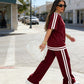 Conjunto de camiseta de rayas y pantalones anchos para mujer
