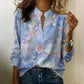Blusa femenina con estampado floral y escote en V