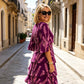 Vestido midi de niveles chic con patrón floral