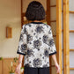 Elegante conjunto femenino: top estampado y pantalones hasta el tobillo