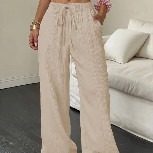 Pantalones de pierna ancha de color sólido con arrugas