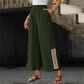 Pantalones de cintura elástica y piernas anchas con borla de mujer