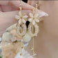 📢📢¡50% DE DESCUENTO! ⏰Pendientes colgantes con borlas de flores elegantes