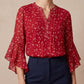 Blusa de mujer con estampado floral cuello en V y mangas 3/4 con volantes