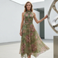 Elegante vestido largo de estampado floral con escote halter