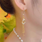 Aretes de Gancho con Borlas Geométricas Elegantes