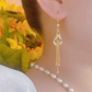 Aretes de Gancho con Borlas Geométricas Elegantes